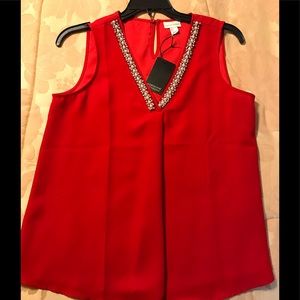 Sleeveless red top, jeweled neckline. NWT. Size L.